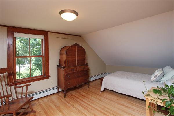 18 Walnut Road Hamilton, MA 01982 - Photo 11 of 14 a bedroom with a bed and a window