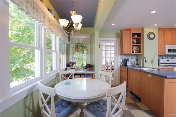 18 Walnut Road Hamilton, MA 01982 - Photo 2 of 14 a view of a dining room with furniture a chandelier and wooden floor