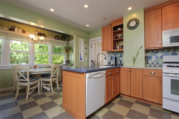 18 Walnut Road Hamilton, MA 01982 - Photo 3 of 14 a kitchen with stainless steel appliances granite countertop a stove a sink and a microwave