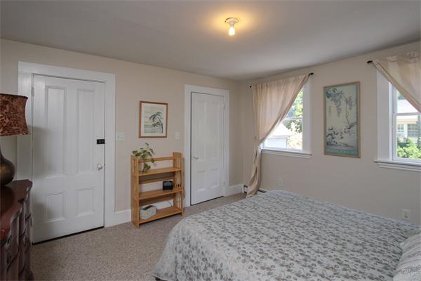 18 Walnut Road Hamilton, MA 01982 - Photo 8 of 14 a bedroom with a bed and a window