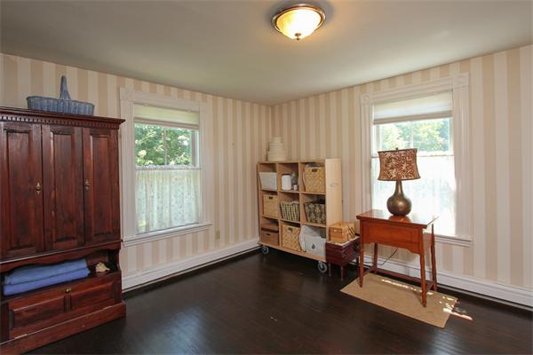 18 Walnut Road Hamilton, MA 01982 - Photo 9 of 14 a room with lounge chair and windows