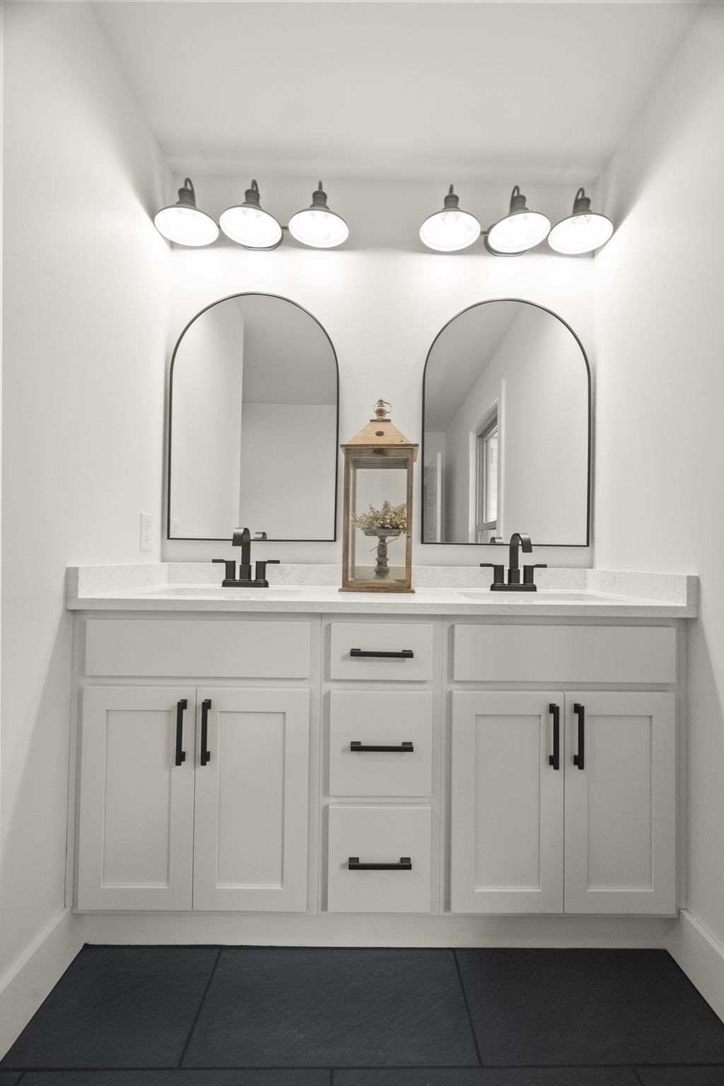 5670 Lakeview Road Springfield, TN 37172 - Photo 18 of 50 a bathroom with double vanity white cabinets and a sink