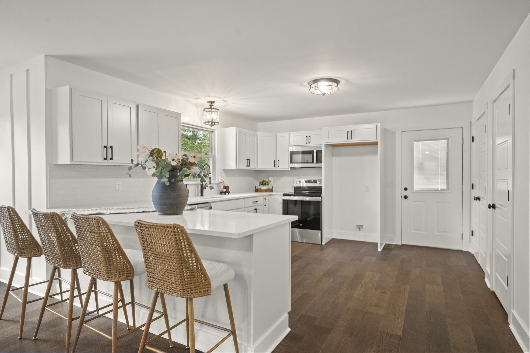 5670 Lakeview Road Springfield, TN 37172 - Photo 23 of 50 a kitchen with white cabinets and stainless steel appliances