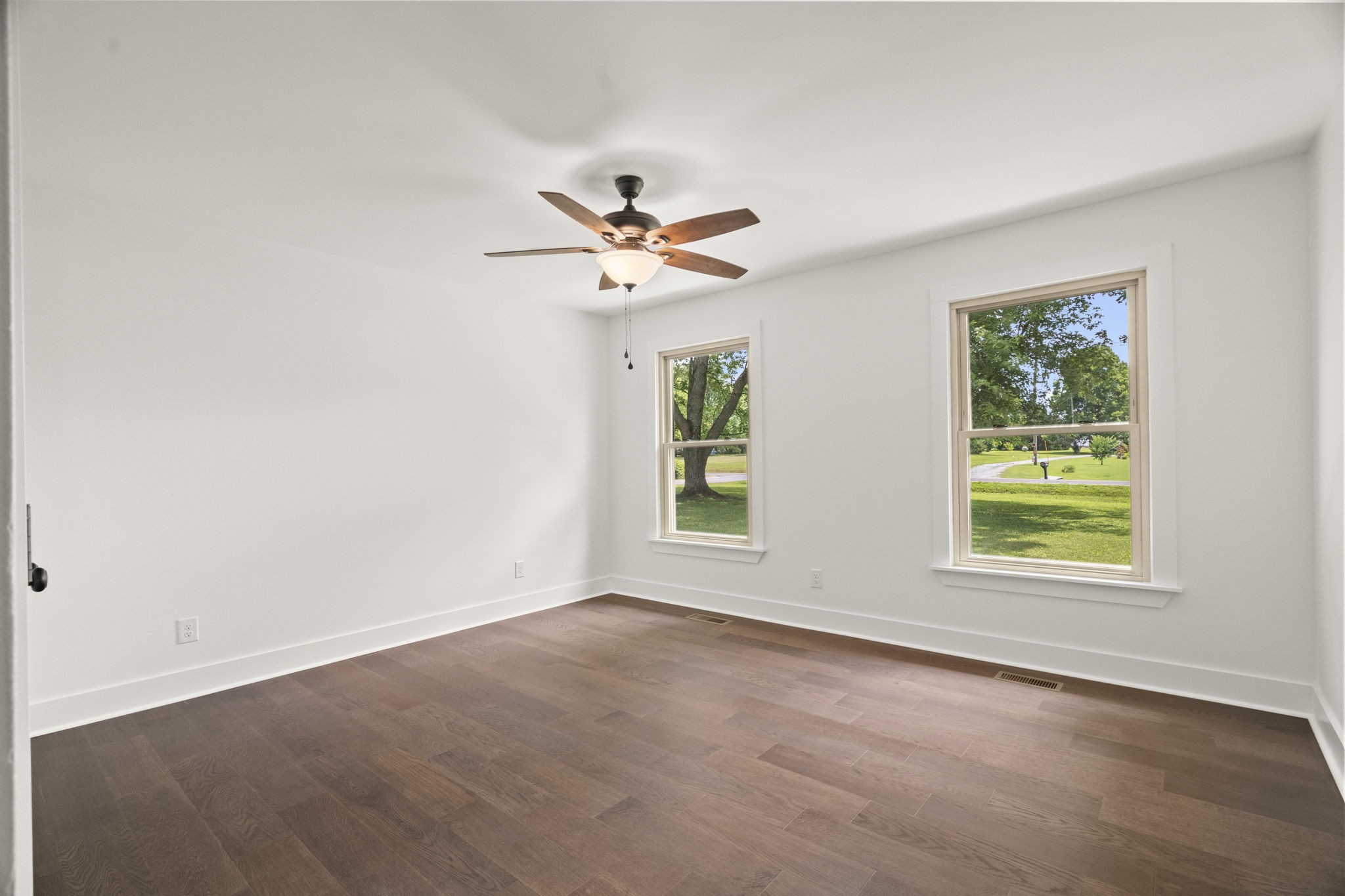 5670 Lakeview Road Springfield, TN 37172 - Photo 31 of 50 an empty room with a window and a fan