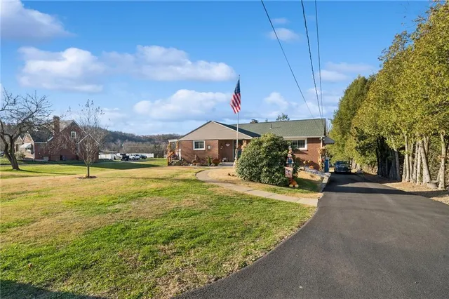a view of a house with swimming pool