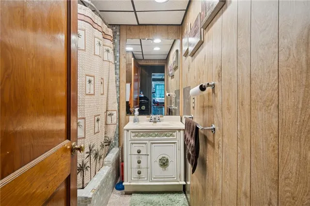 a view of living room with furniture and a chandelier