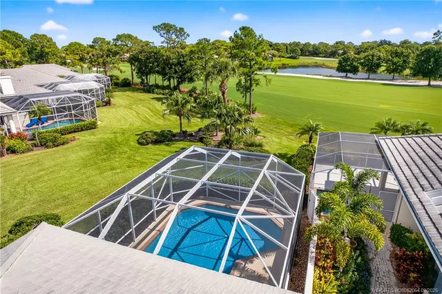a view of a backyard with a ocean view