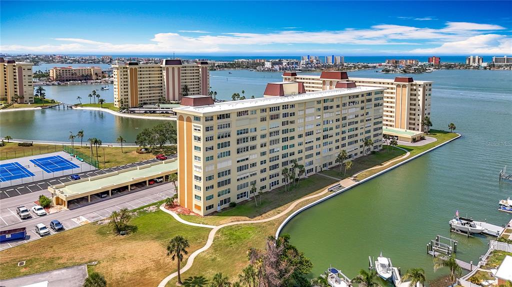 4725 Cove Circle, Unit 908 St. Petersburg, FL 33708 - Photo 43 of 61 a view of a balcony with an ocean view