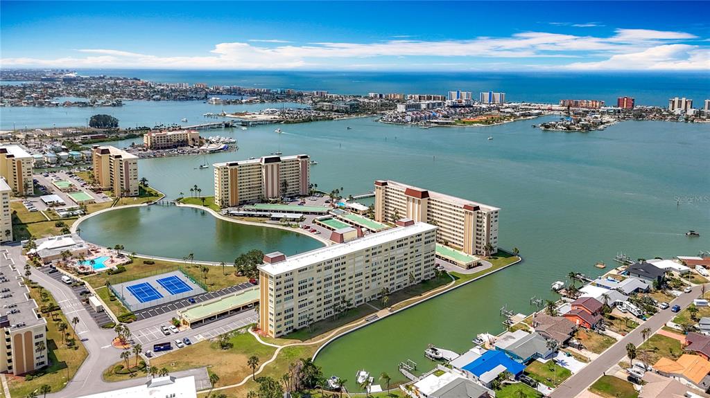 4725 Cove Circle, Unit 908 St. Petersburg, FL 33708 - Photo 47 of 61 an aerial view of a city