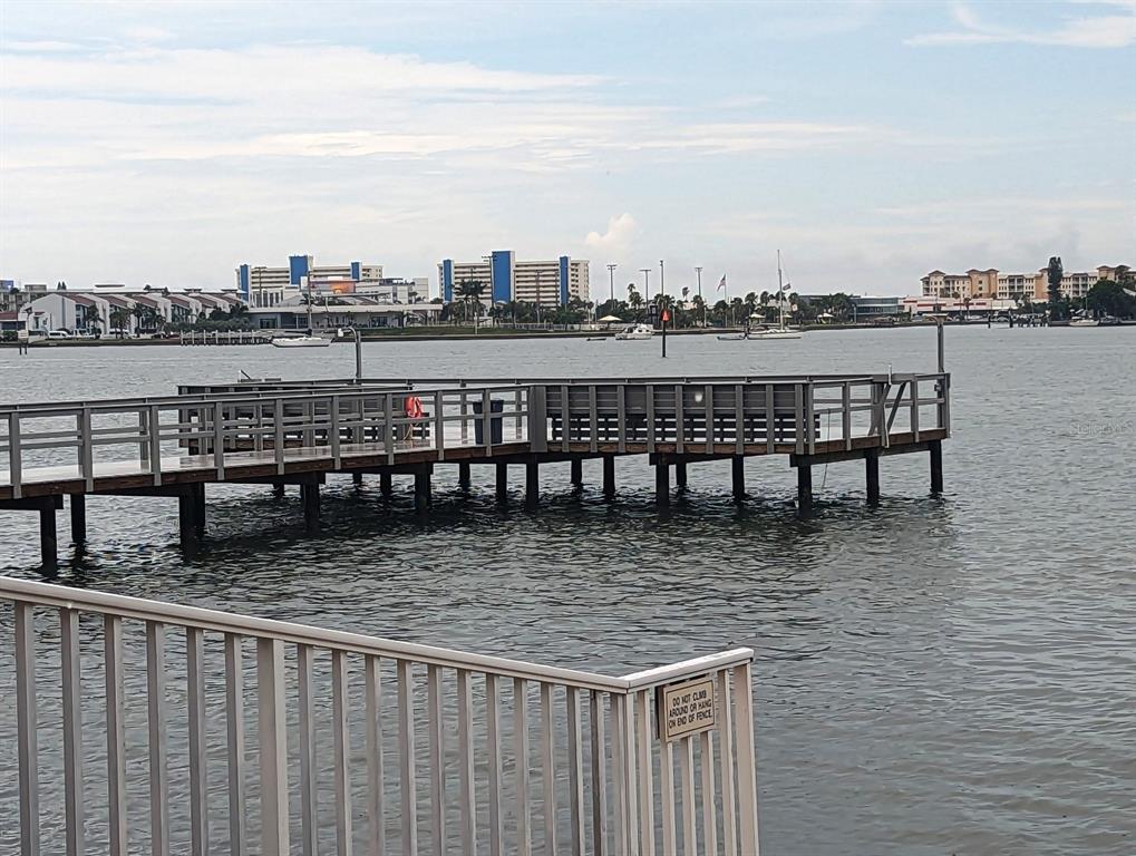 4725 Cove Circle, Unit 908 St. Petersburg, FL 33708 - Photo 56 of 61 a view of a roof deck with city view