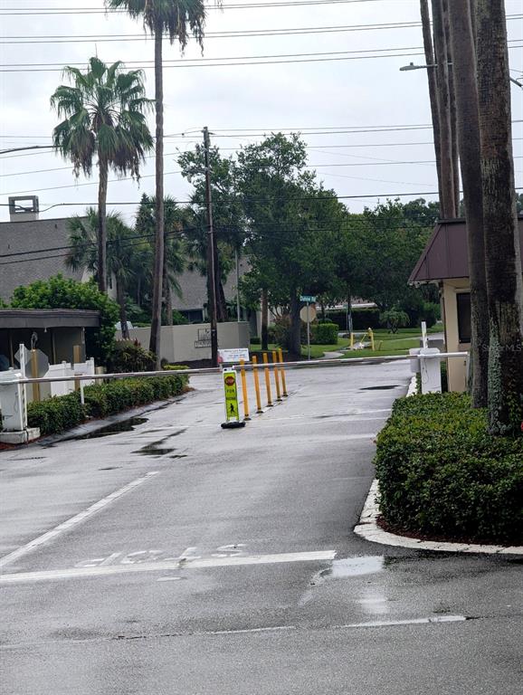 4725 Cove Circle, Unit 908 St. Petersburg, FL 33708 - Photo 60 of 61 a view of a parking area