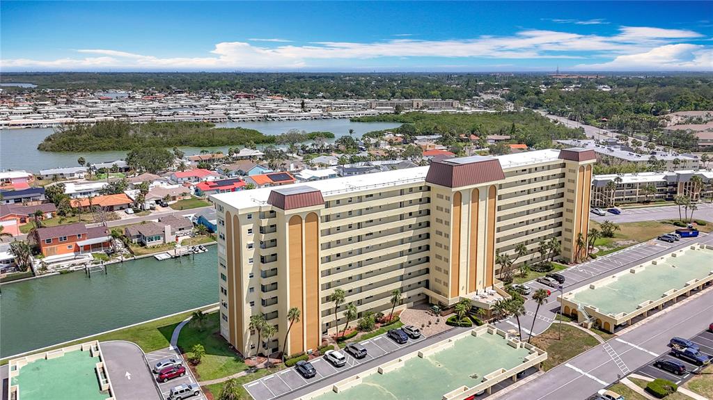 4725 Cove Circle, Unit 908 St. Petersburg, FL 33708 - Photo 8 of 61 a view of a city with an ocean