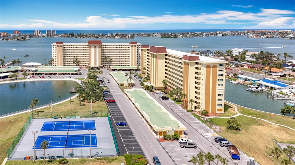 4725 Cove Circle, Unit 908 St. Petersburg, FL 33708 - Photo 10 of 61 a view of a city with an ocean