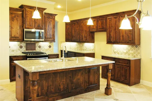 a kitchen with a sink and a cabinets