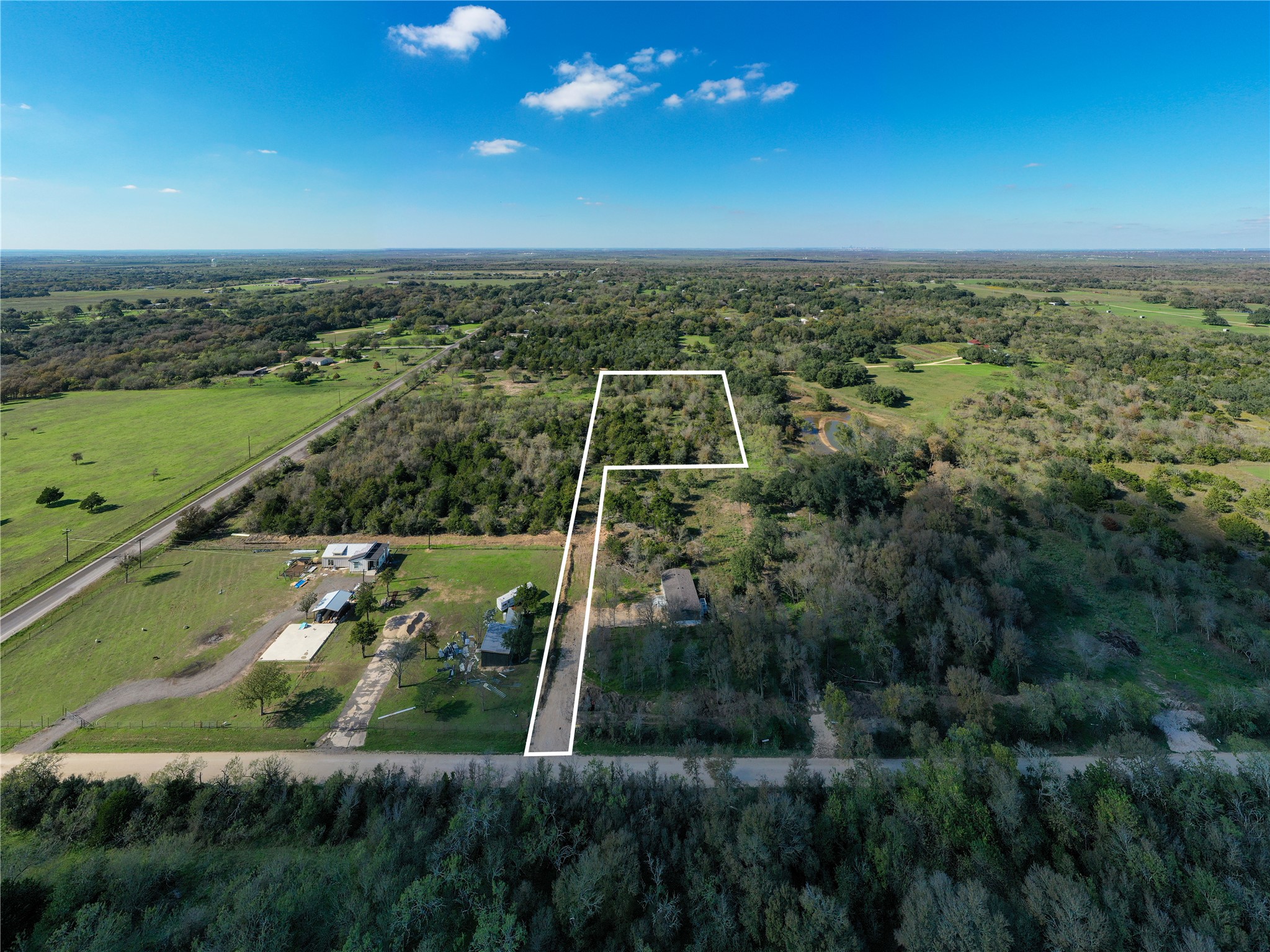 105 Crooked Road Dale, TX 78616 - Photo 6 of 11 an aerial view of a city