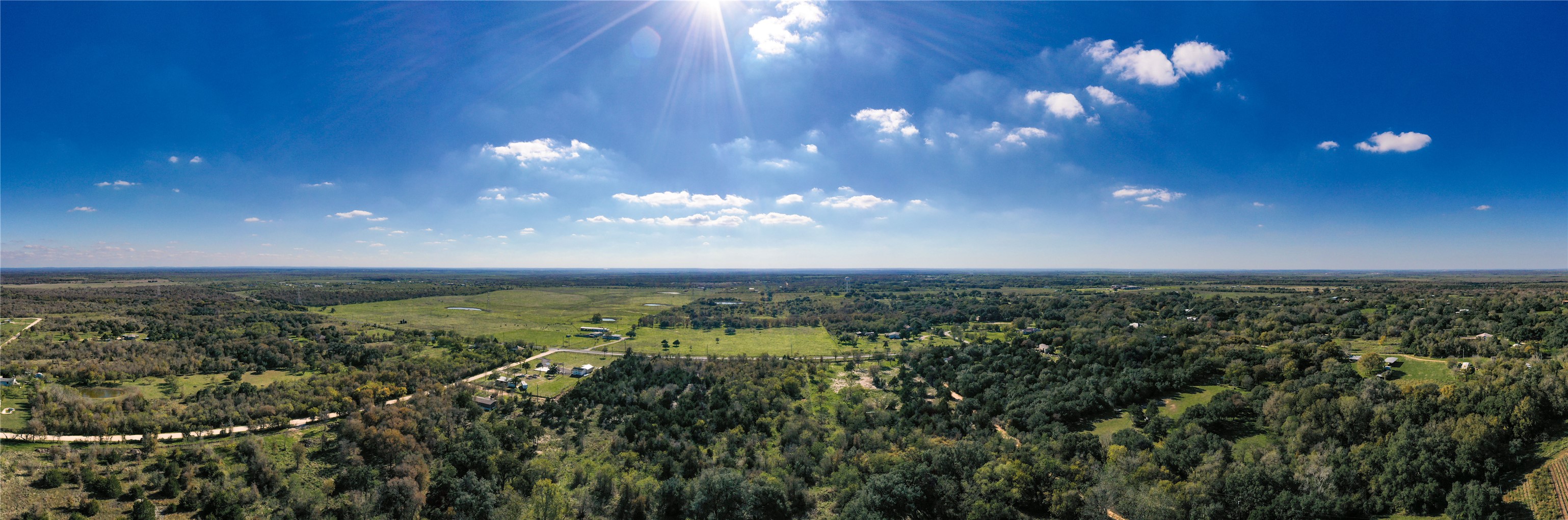 105 Crooked Road Dale, TX 78616 - Photo 9 of 11 a view of a city with lots of green space