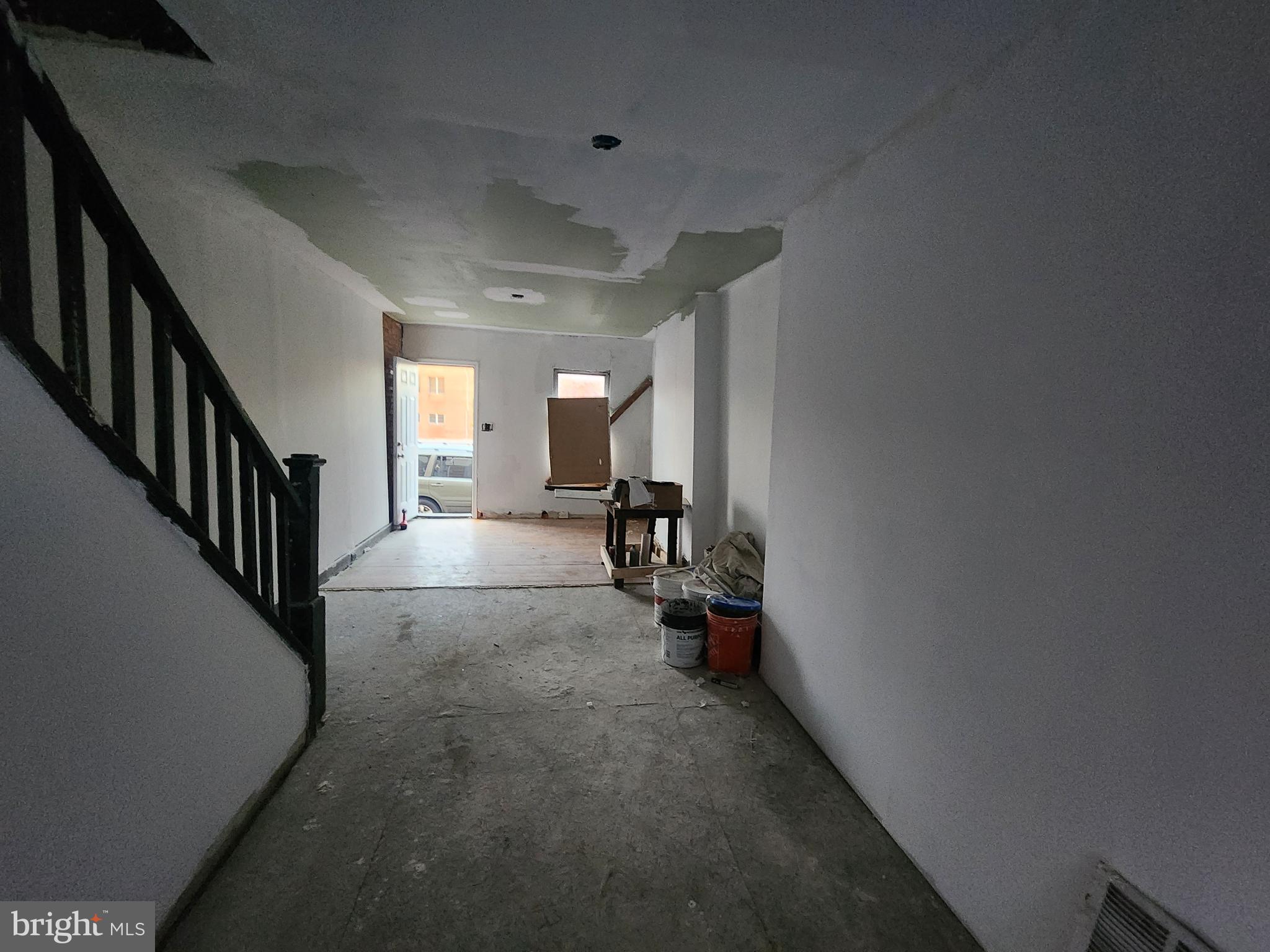 409 South Pulaski Street Baltimore, MD 21223 - Photo 2 of 9 a view of a hallway with seating area