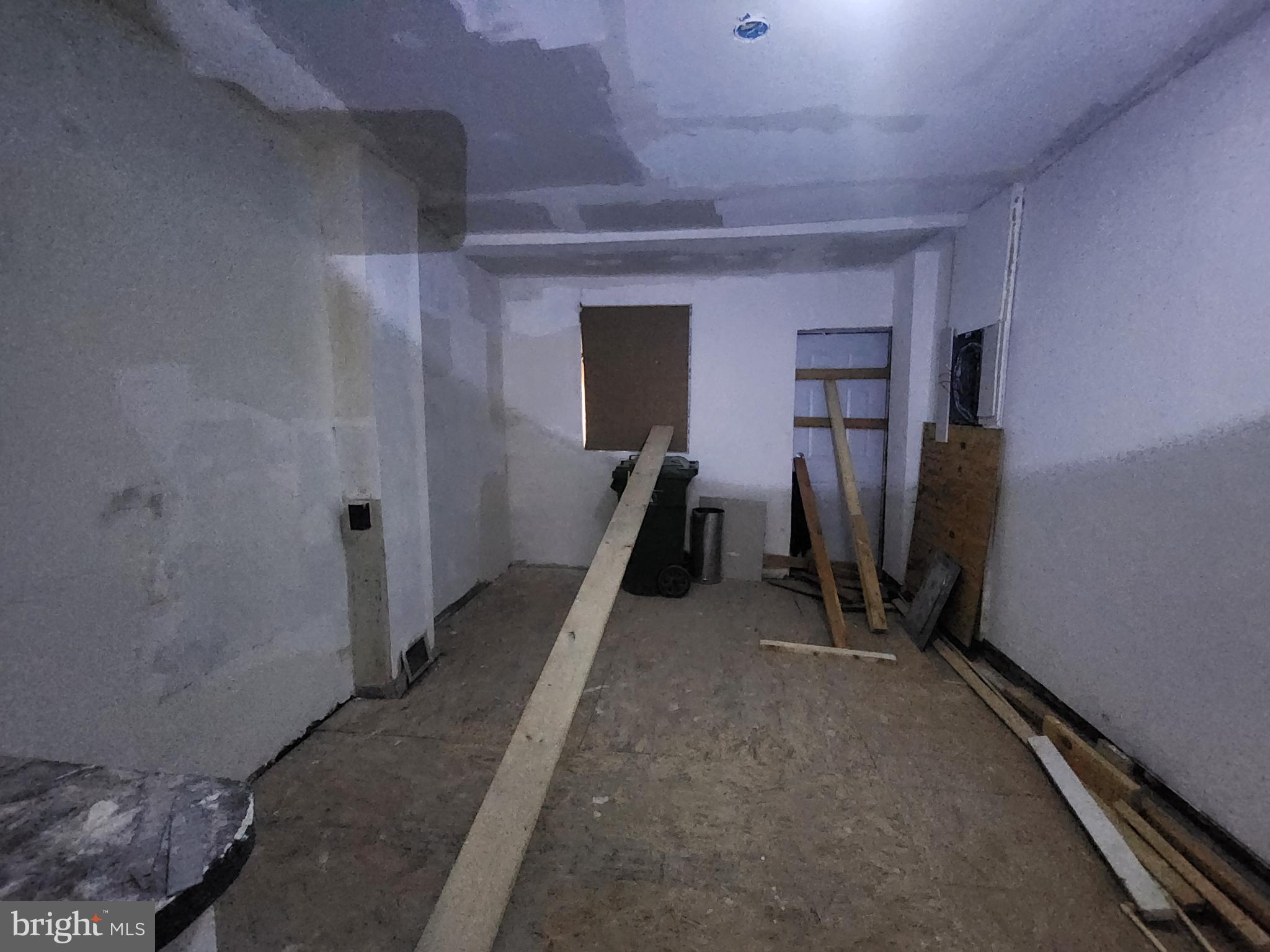 409 South Pulaski Street Baltimore, MD 21223 - Photo 4 of 9 a view of a room with gym equipment