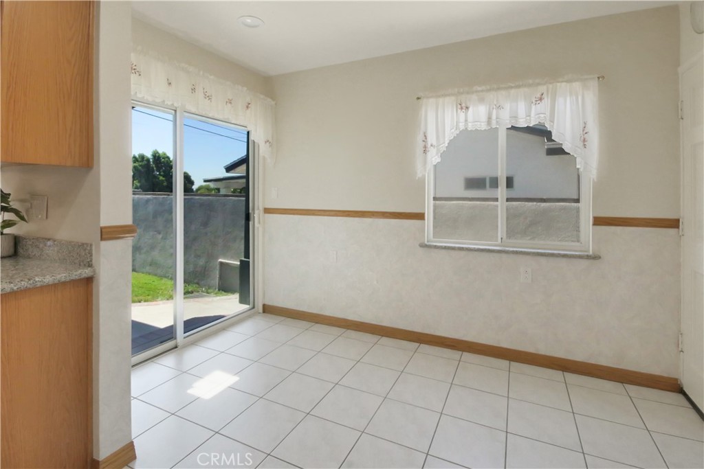 14524 Rio Blanco Road La Mirada, CA 90638 - Photo 13 of 34 Dine in kitchen space with slider to back patio and built-in BBQ.