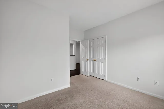 a bathroom with a bathtub shower sink vanity and toilet