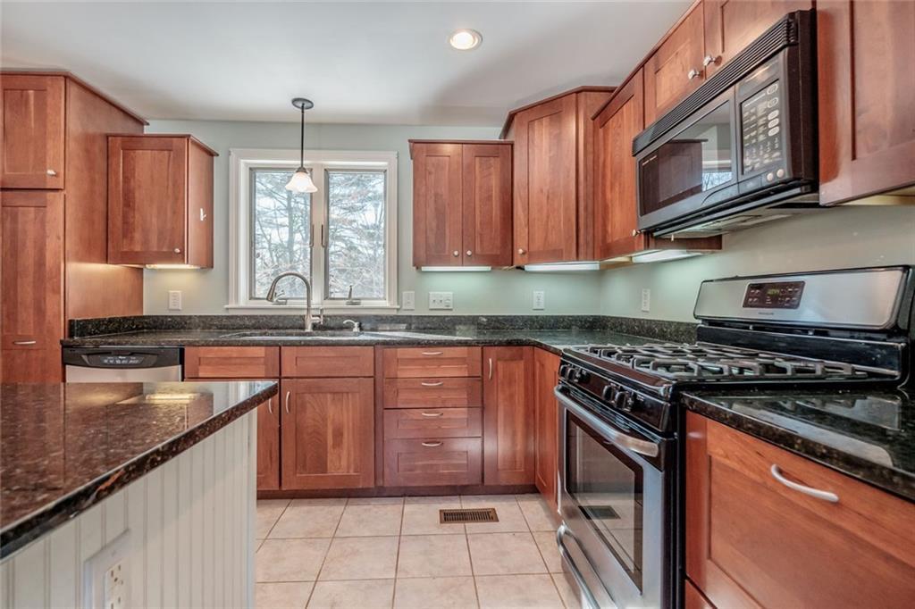 18 Lowell Road Gorham, ME 04038 - Photo 14 of 35 Beautiful Cherry Kitchen with Gas Stove