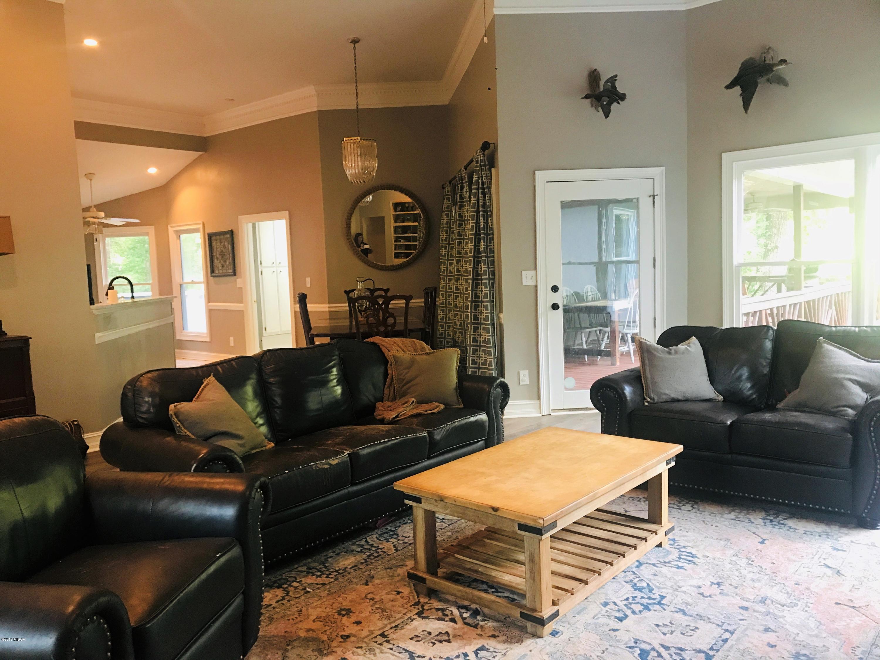1569 Johnson Road Macon, GA 31220 - Photo 3 of 28 a living room with furniture and a window