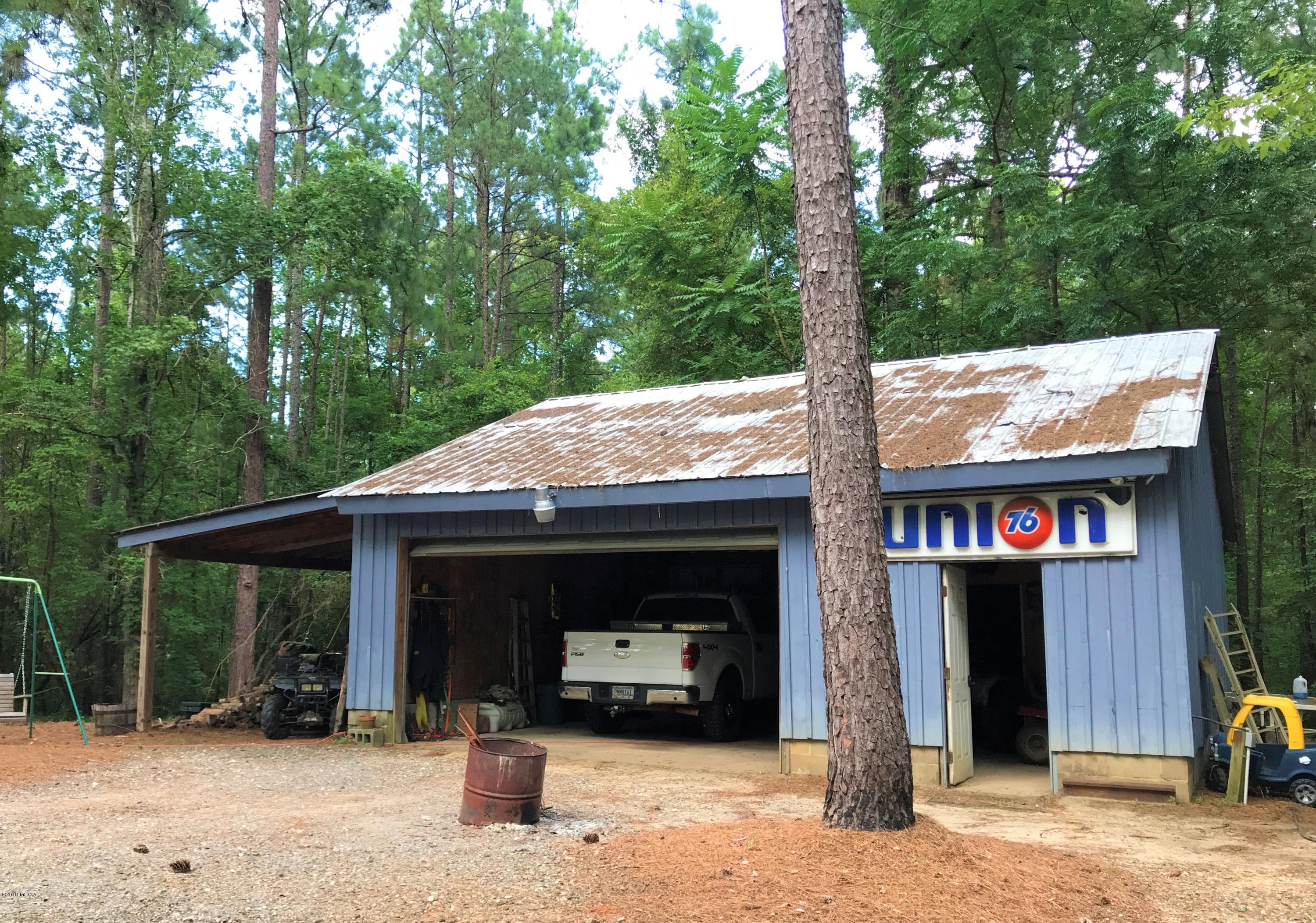 1569 Johnson Road Macon, GA 31220 - Photo 22 of 28 a view of a car park in front of house