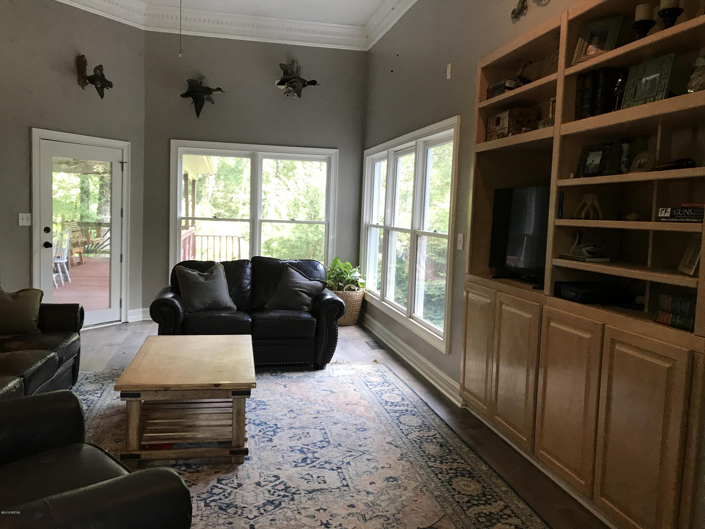 1569 Johnson Road Macon, GA 31220 - Photo 5 of 28 a living room with furniture or couch and a window