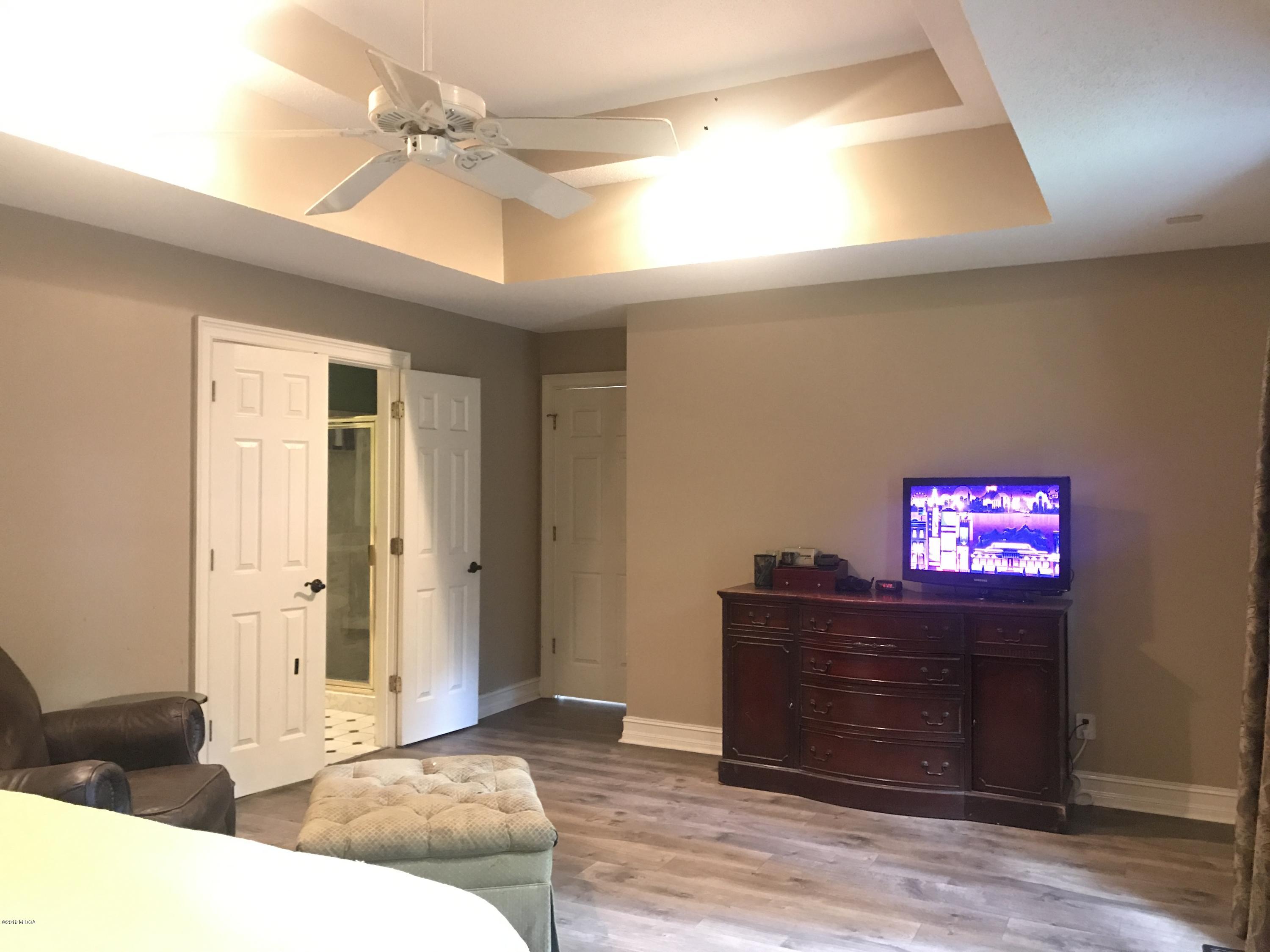 1569 Johnson Road Macon, GA 31220 - Photo 8 of 28 a living room with furniture and a dresser