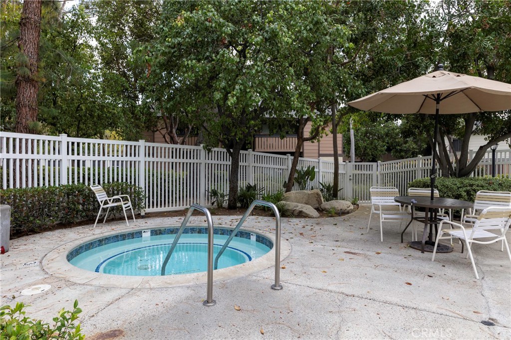20702 El Toro Road, Unit 178 Lake Forest, CA 92630 - Photo 23 of 30 a view of a chairs and table in the patio
