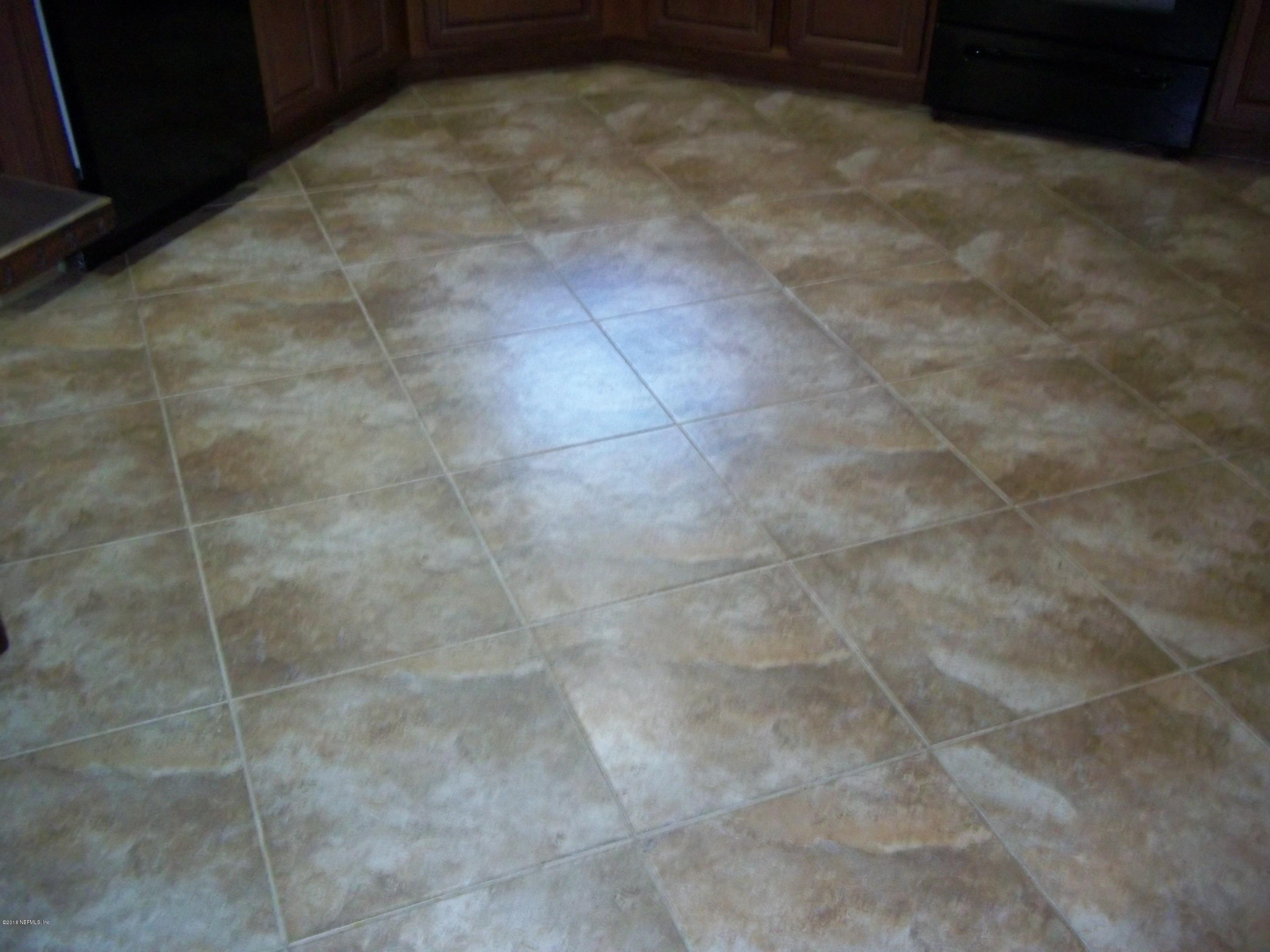 5579 Long Branch Road Jacksonville, FL 32234 - Photo 25 of 54 a bathroom with a shower