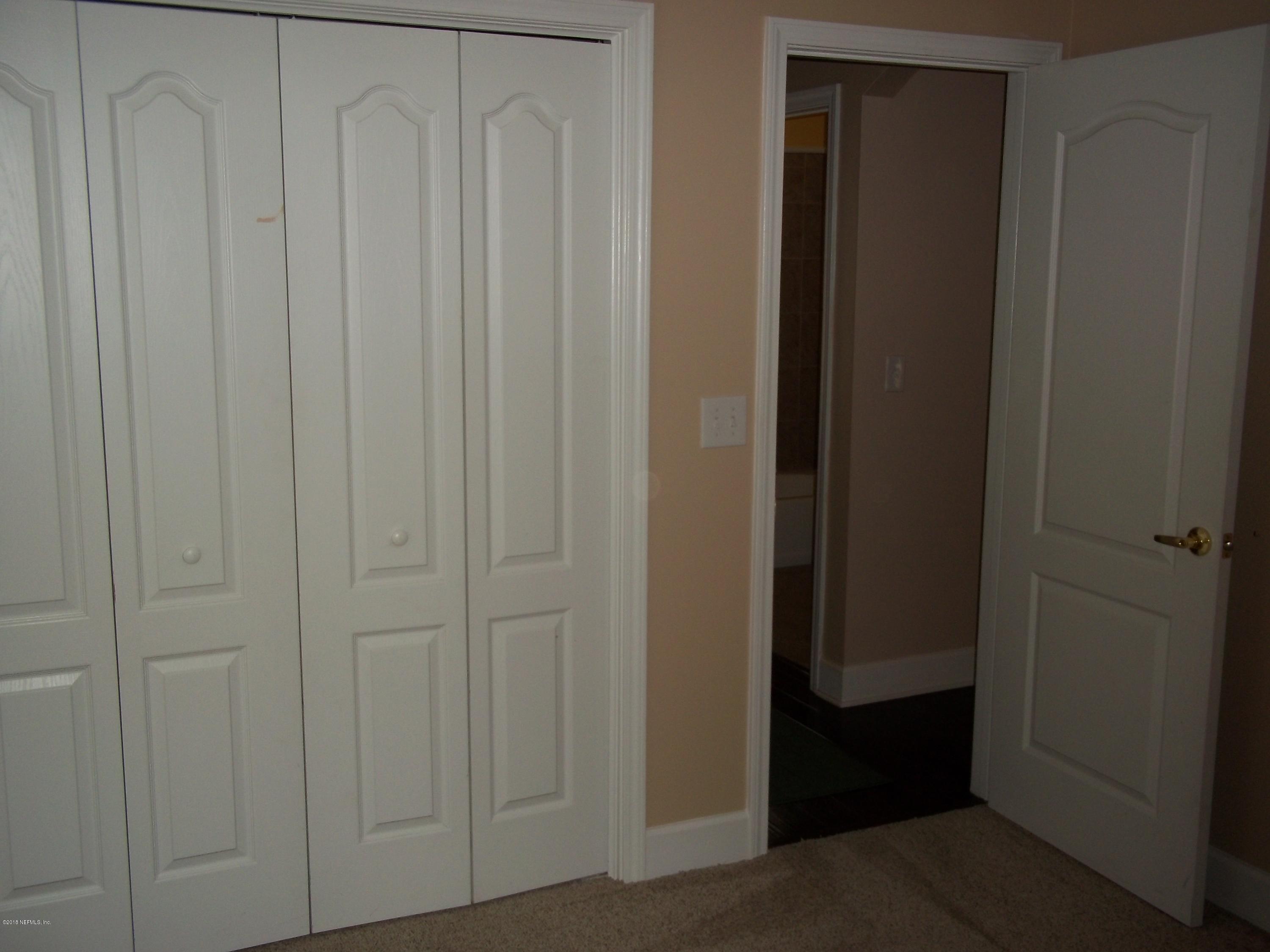 5579 Long Branch Road Jacksonville, FL 32234 - Photo 32 of 54 a view of a closet