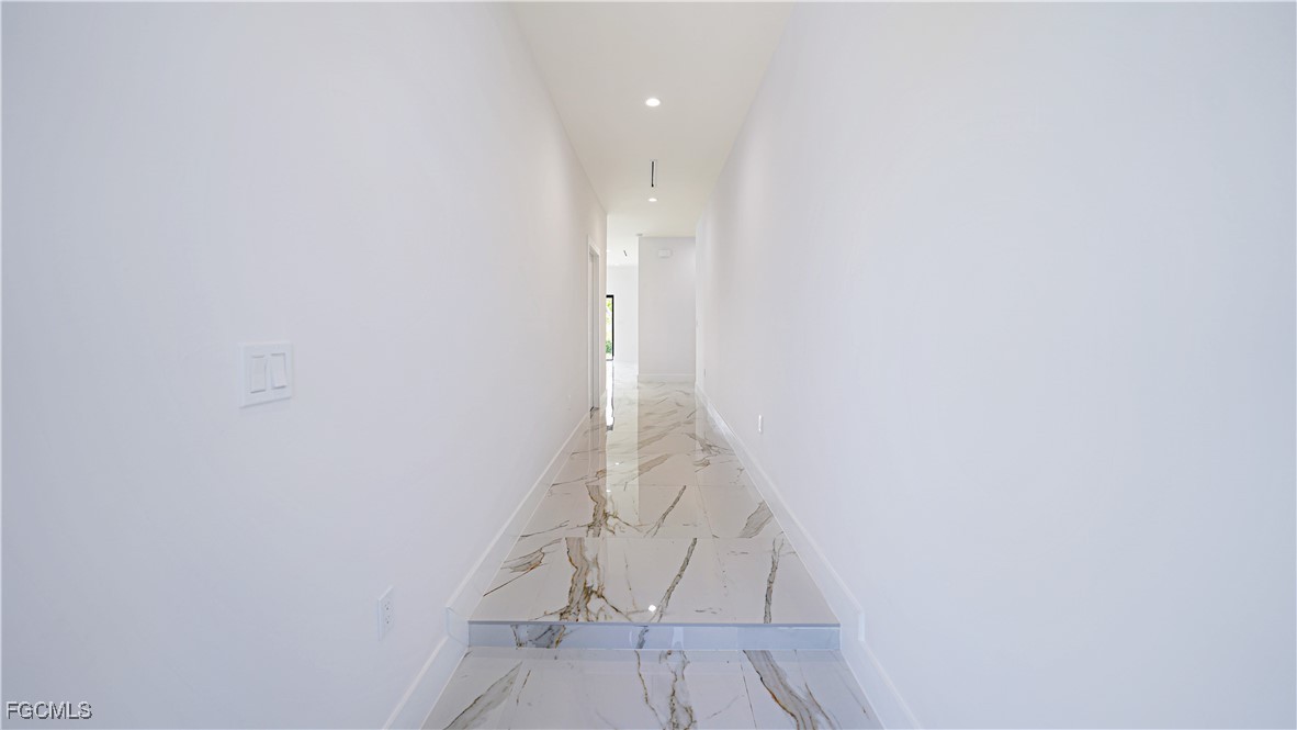 123 Ichabod Avenue Lehigh Acres, FL 33973 - Photo 13 of 42 a view of an entryway