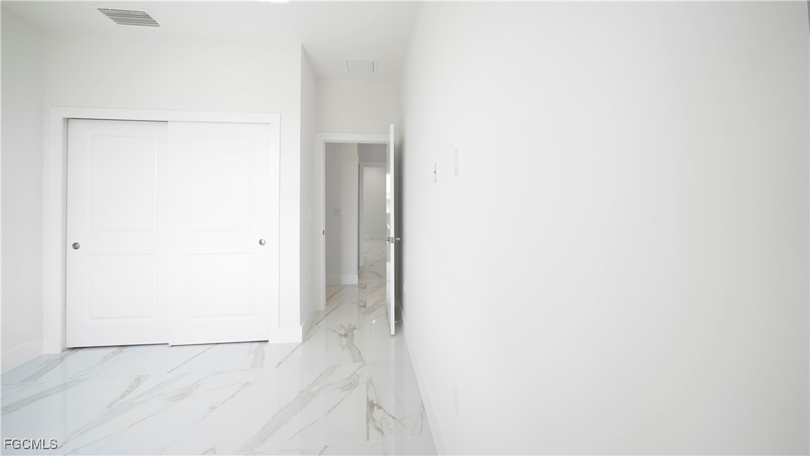 123 Ichabod Avenue Lehigh Acres, FL 33973 - Photo 32 of 42 a view of a small space