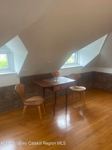 a workspace with furniture and window