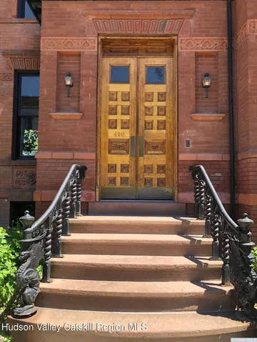 a view of entryway with a front door