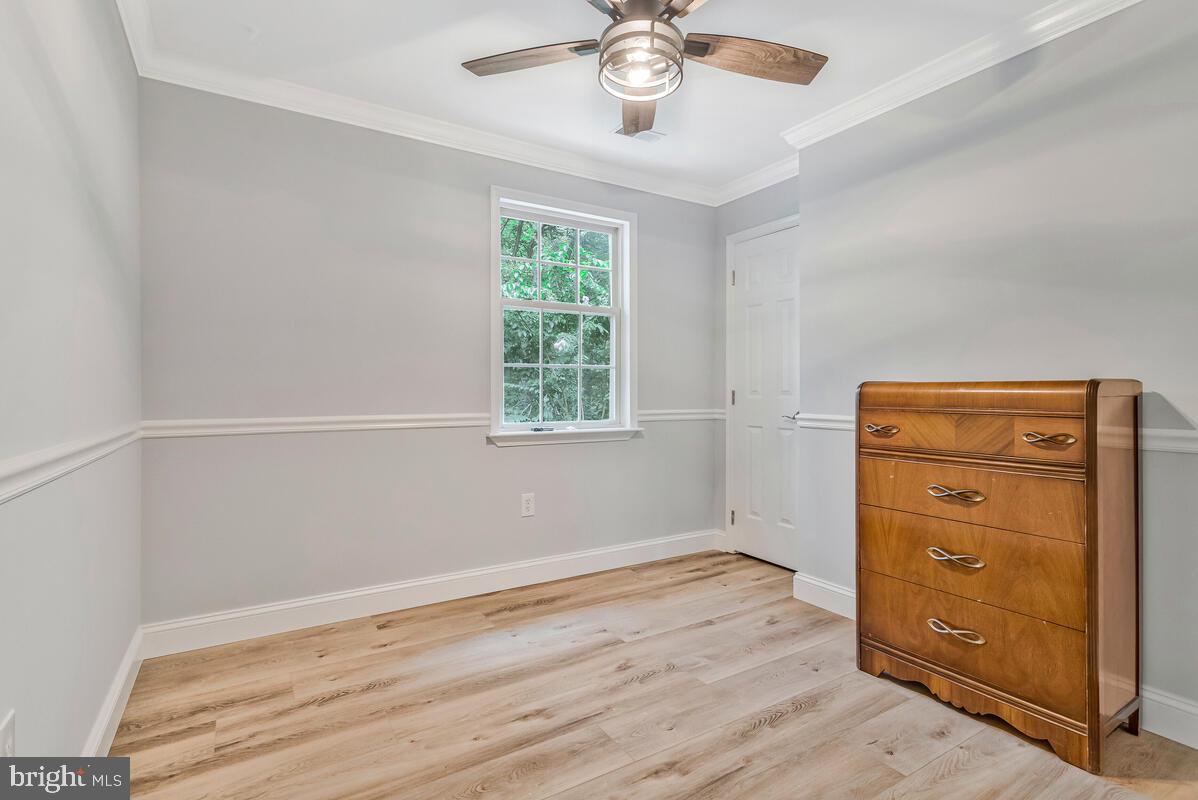 5963 Hillside Road St. Leonard, MD 20685 - Photo 36 of 54 wooden floor and window in a room