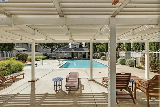 a room with lots of tables and chairs