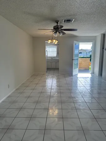 a view of an empty room and window