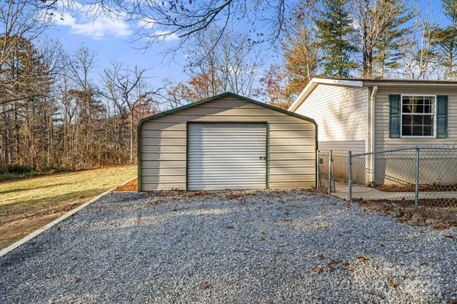 a view of a house with a window and brick walls