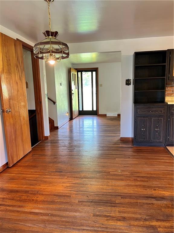880 Pizza Barn Road Blairsville, PA 15717 - Photo 28 of 44 a view of hallway with wooden floor and chandelier