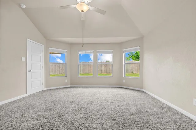 an empty room with windows