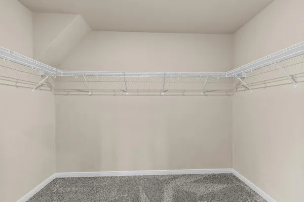 a view of a room with racks on the wall