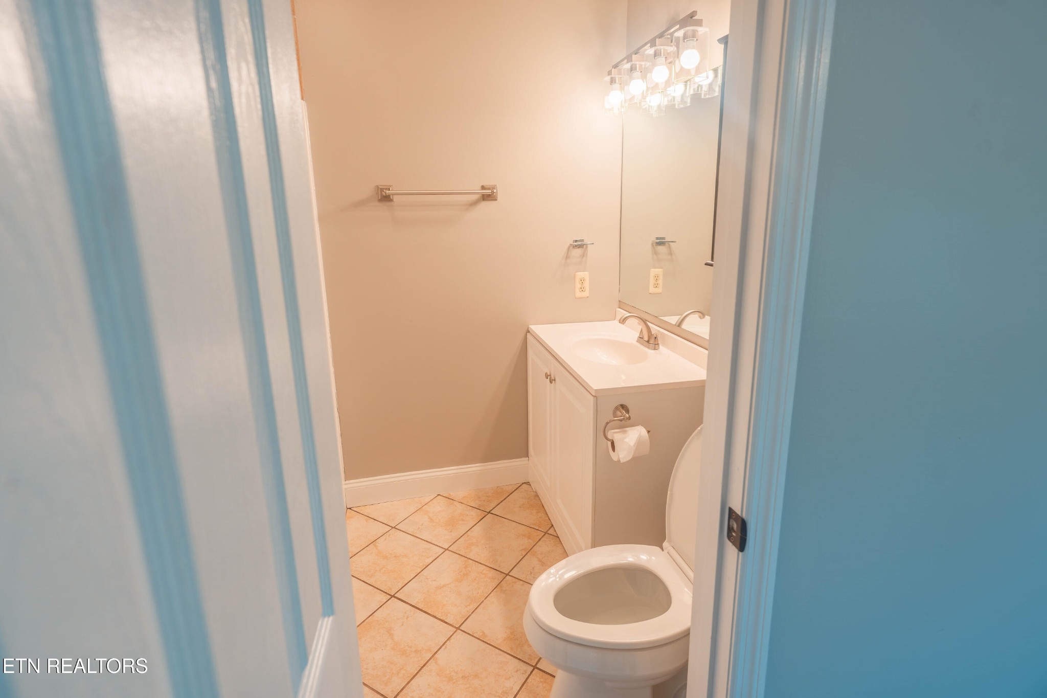 7722 Ashcroft Way Powell, TN 37849 - Photo 17 of 24 a bathroom with a toilet and a sink