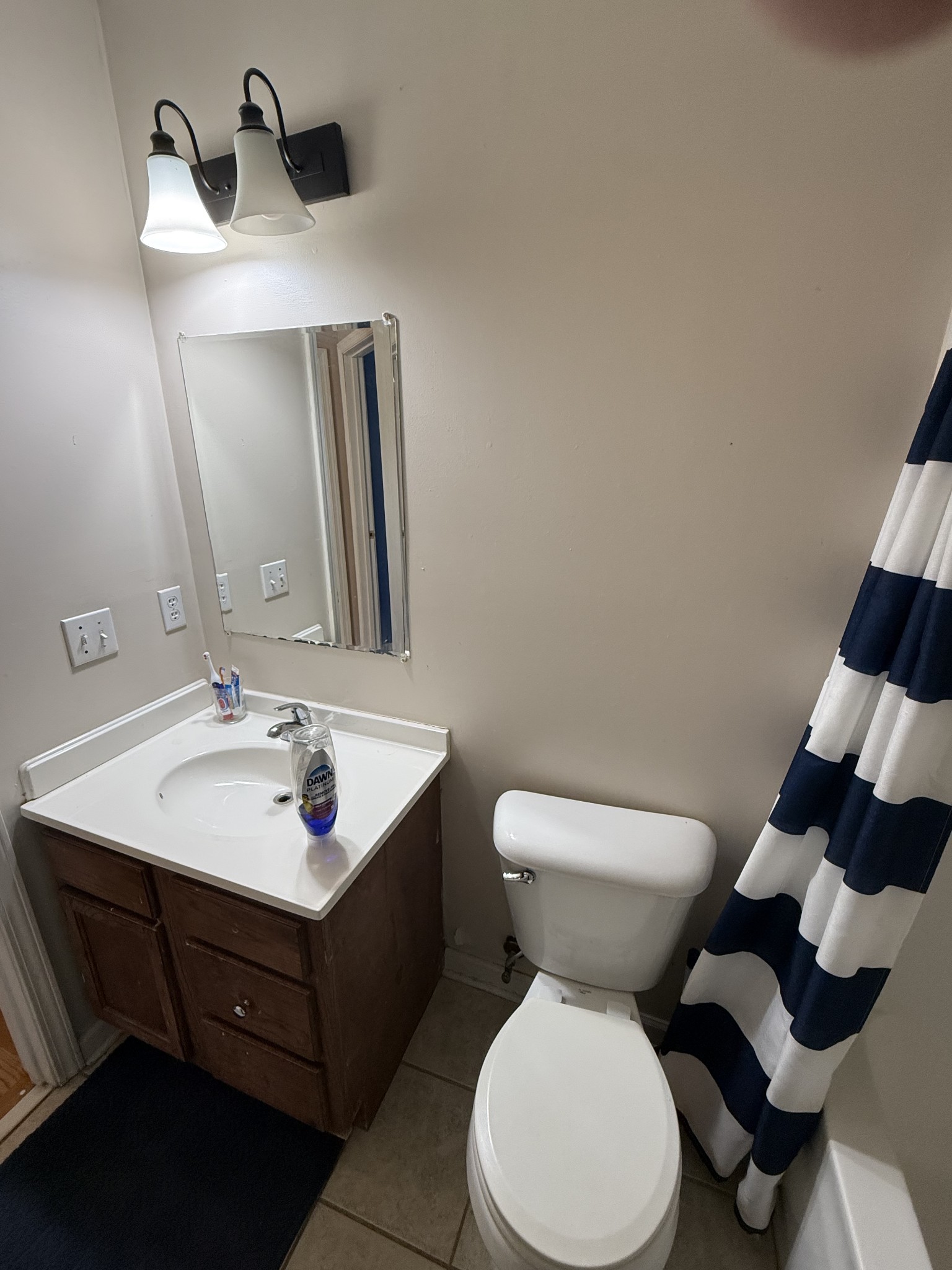 1702 Abiff Road Burns, TN 37029 - Photo 25 of 47 a bathroom with a toilet sink and mirror