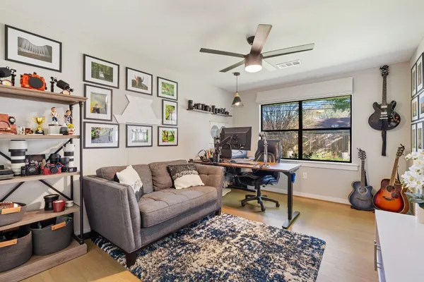 a living room with furniture and a window