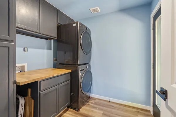a utility room with washer and dryer