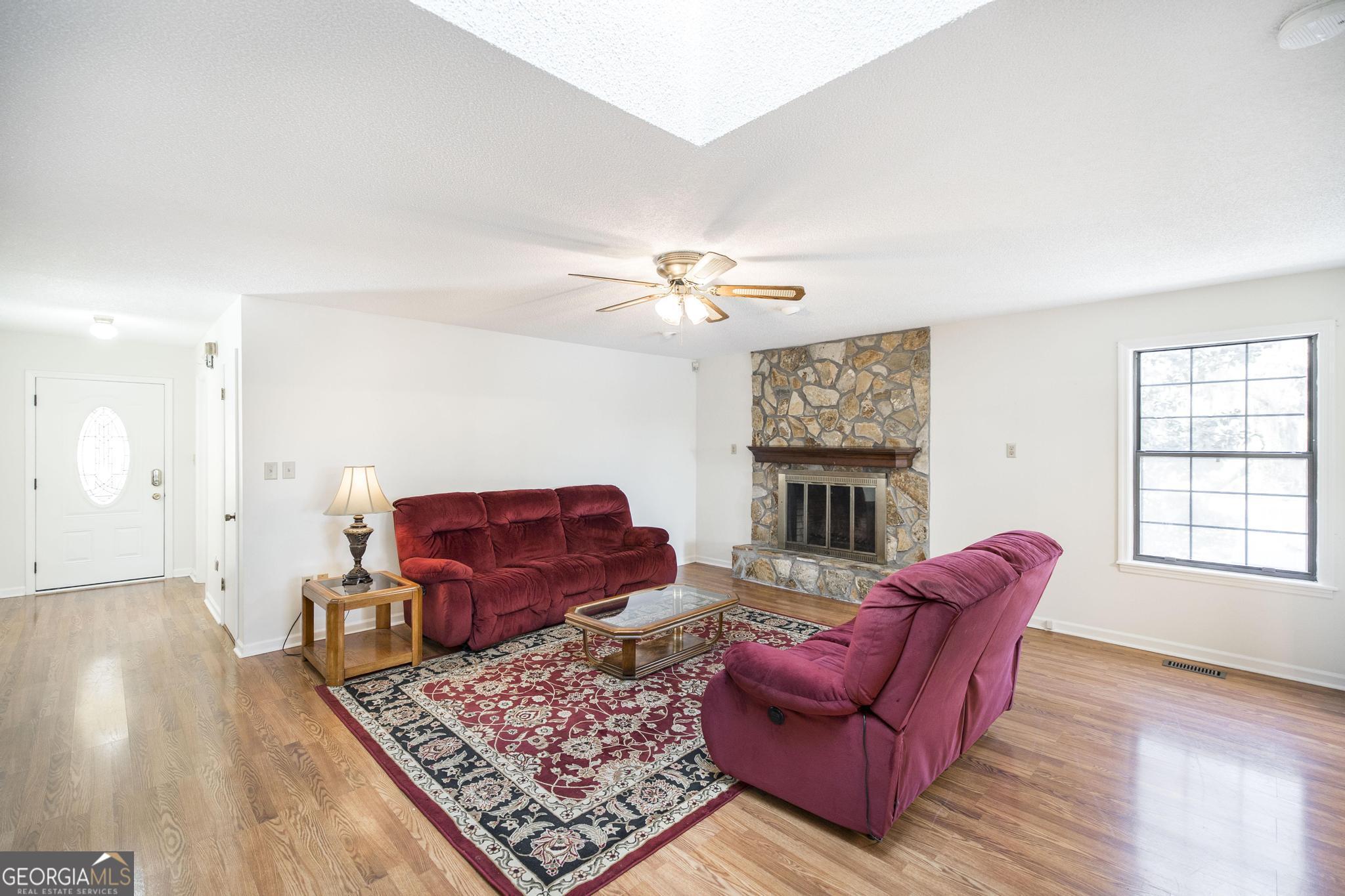 240 Mossland Drive Perry, GA 31069 - Photo 16 of 36 a living room with furniture rug and window