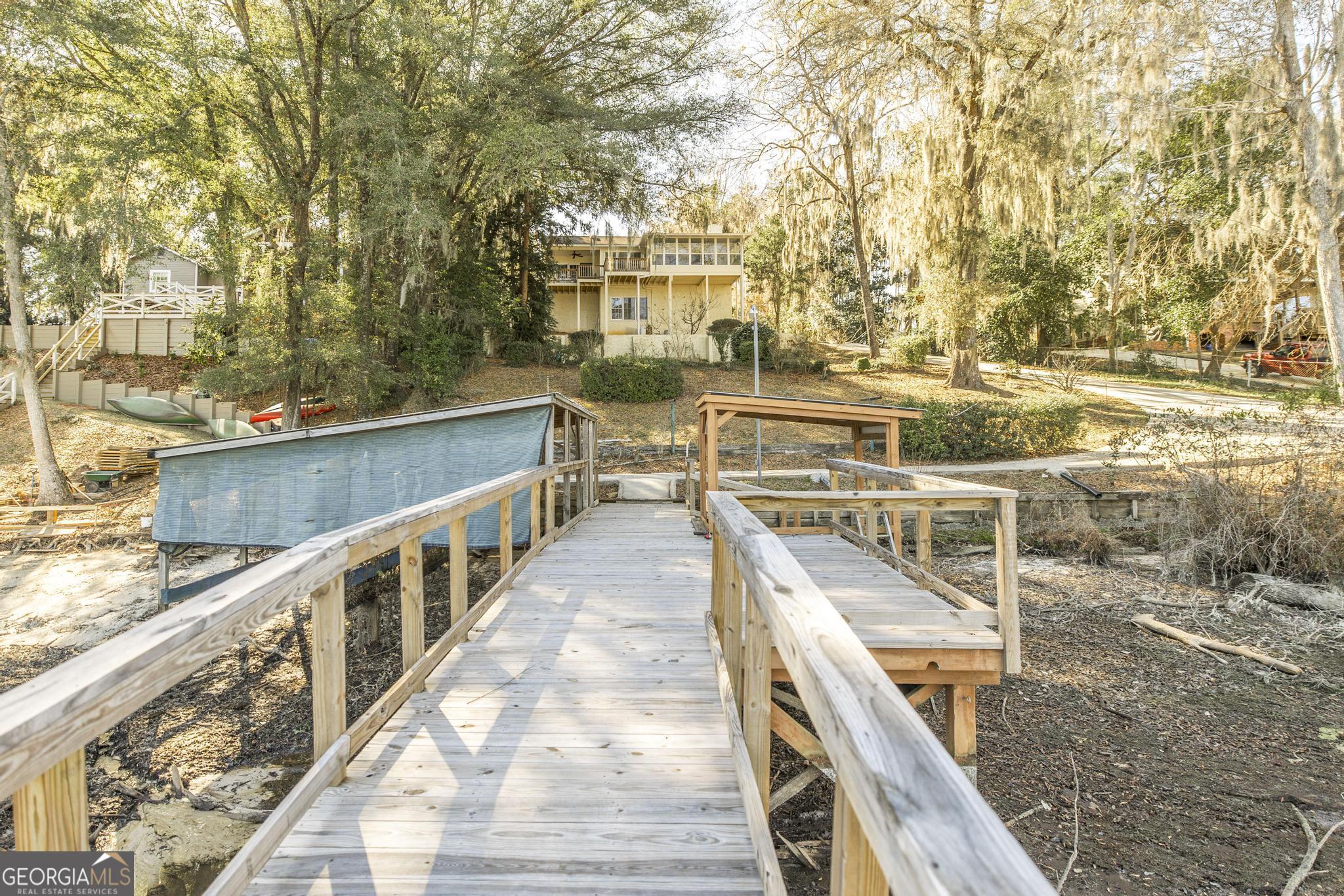 240 Mossland Drive Perry, GA 31069 - Photo 36 of 36 a view of balcony with two large trees