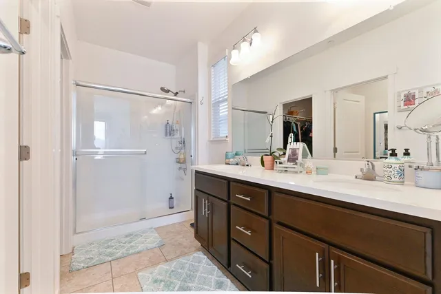 a kitchen with lots of counter top space a sink and appliances